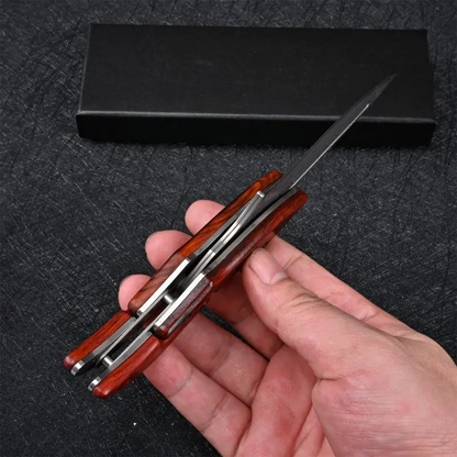 Mechanical folding knife